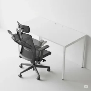 "Office chair flip up arms demonstrating easy clearance under a compact desk."