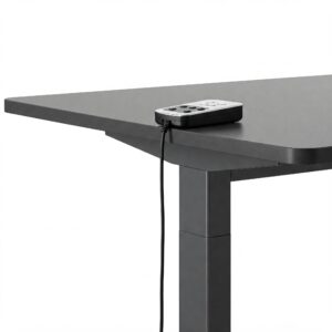Wired standing desk controller connected to an adjustable height desk frame.