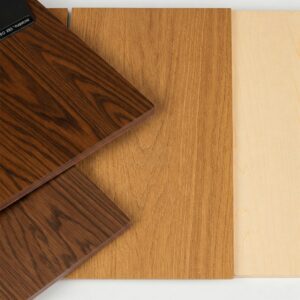 Variety of wood standing desks types: oak, maple, and walnut.