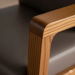 "Close-up of the natural wood grain and smooth finish on a high-quality wood office chair."