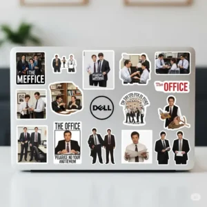 A laptop decorated with various "the office stickers", demonstrating how these fun decals can personalize tech accessories.