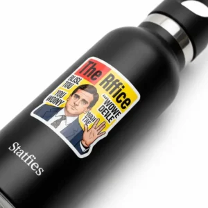 A close-up of a water bottle adorned with a humorous "office sticker", highlighting their durability and appeal for personal expression.