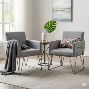 Two modern grey set of 2 living room accent chairs with metal legs, perfect for a contemporary living room setting.