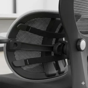 Close-up of a compact desk chair's lumbar support system for back pain relief.
