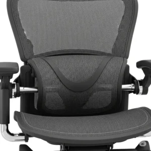 A detailed view of the built-in lumbar support system in a desk chair wide designed for extended use.