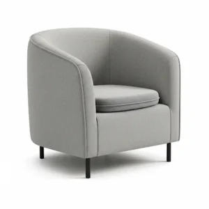 A small leather barrel chair with a classic, dark finish, adding a sophisticated touch to a home office.