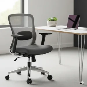 A lightweight and compact task chair, representing a popular style of office chairs made in usa, placed next to a minimalist desk.