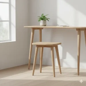 A unique skinny desk chair made from light-colored wood, featuring a simple, backless design. This wooden chair offers a rustic, minimalist alternative for a stylish home office.