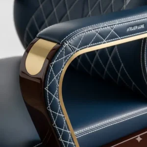  Close-up of the stylish armrests and intricate stitching on a high-end designer desk chair, showcasing its unique craftsmanship and quality materials.