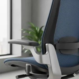 Close-up of an ergonomic blue chair's adjustable lumbar support, one of many colorful desk chairs available.