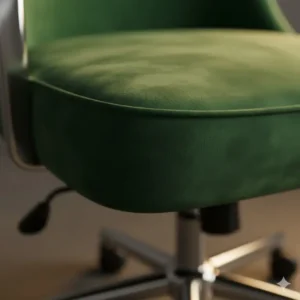 Luxurious velvet green chair showcasing the soft fabric material and design of colorful desk chairs.