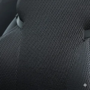 Close-up texture of the breathable mesh material on the backrest support for car.