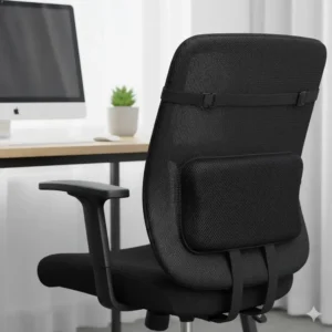 Close-up view of the desk chair back support cushion correctly attached to a standard office chair, improving sitting posture.