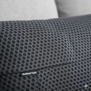 Close-up of the breathable mesh fabric cover on the back support for sofa for improved airflow and cool sitting.