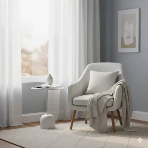 Minimalist white faux leather accent chairs styled in a cozy bedroom corner.