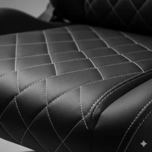 Detailed view of the high-quality stitching and durable PU leather gaming chair material.