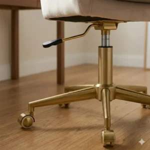 Durable chrome swivel base with wheels on a comfortable plush desk chair.