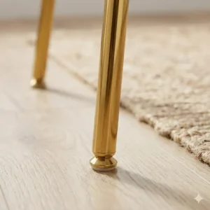 A light pink desk chair gold legs no wheels featuring non-slip floor protectors for safety.