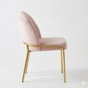 Side profile showing the elegant silhouette of a light pink desk chair gold legs no wheels.
